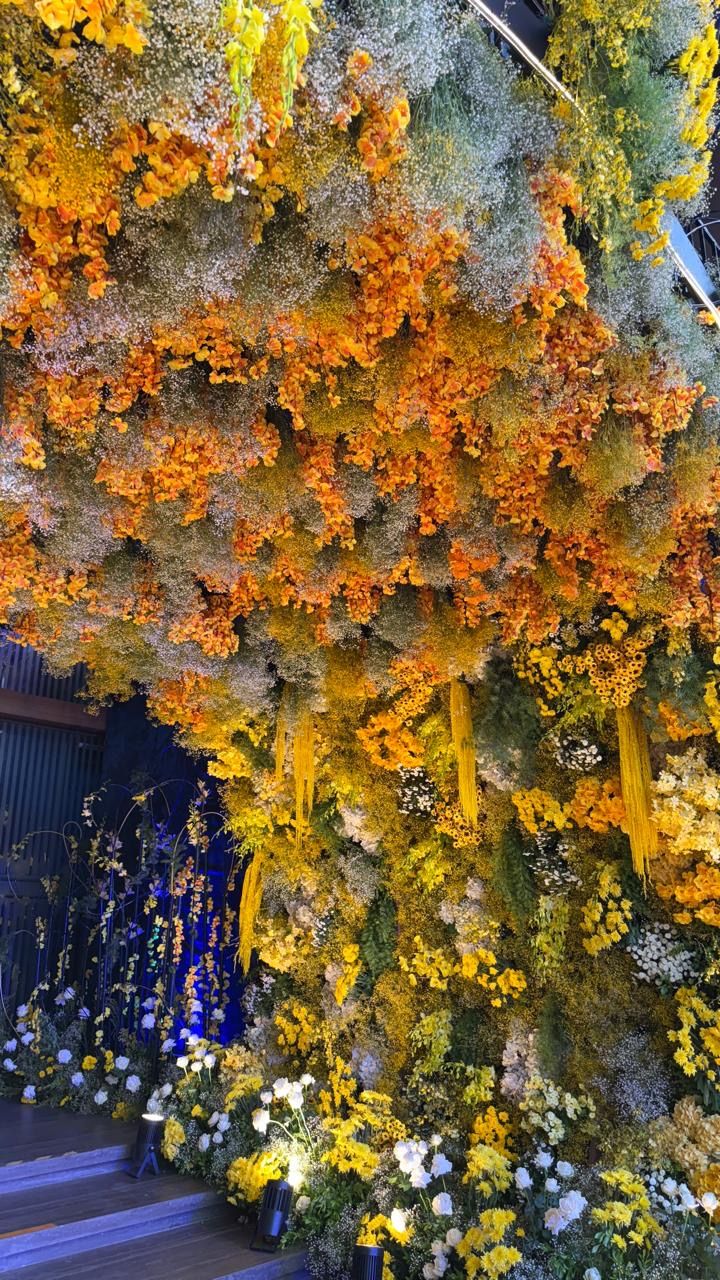 Ceiling of orange and yellow florals cascading down